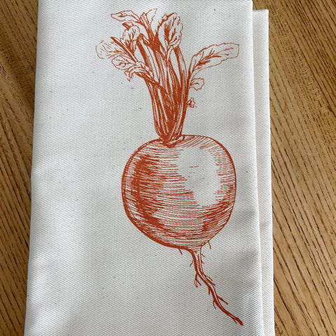 Cotton serviette with orange swede screen print by Lottie Day for Jenny Duff mats
