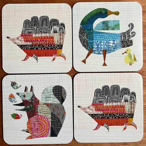 four animal and bird design mats made from collages by Clare Youngs with hedgehog duck duckling juggling squirrel patterns