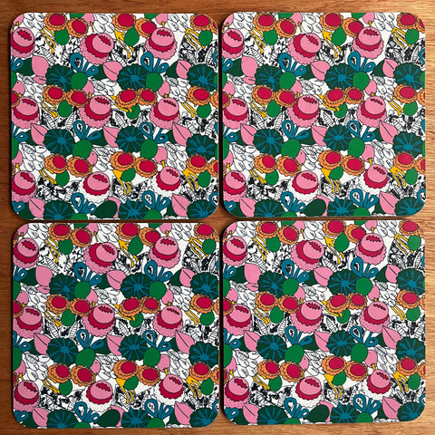 Four floral pattern in pink and green melamine placemats