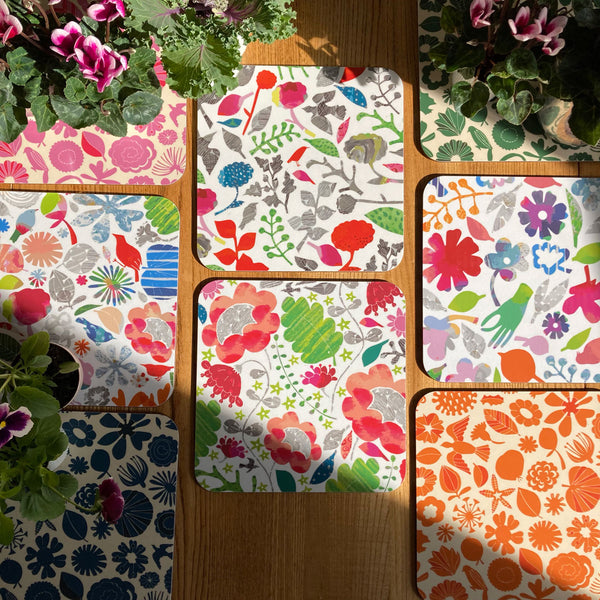 Magic Garden by Lindsay Marsden: Orange design square table mat