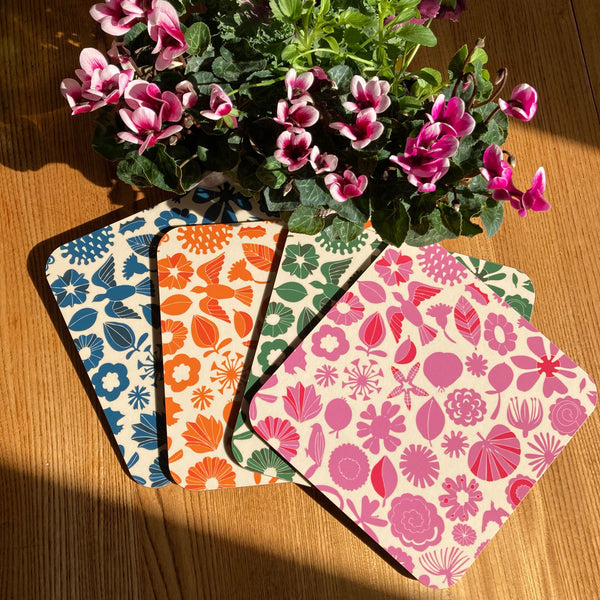 Magic Garden by Lindsay Marsden: Orange design square table mat